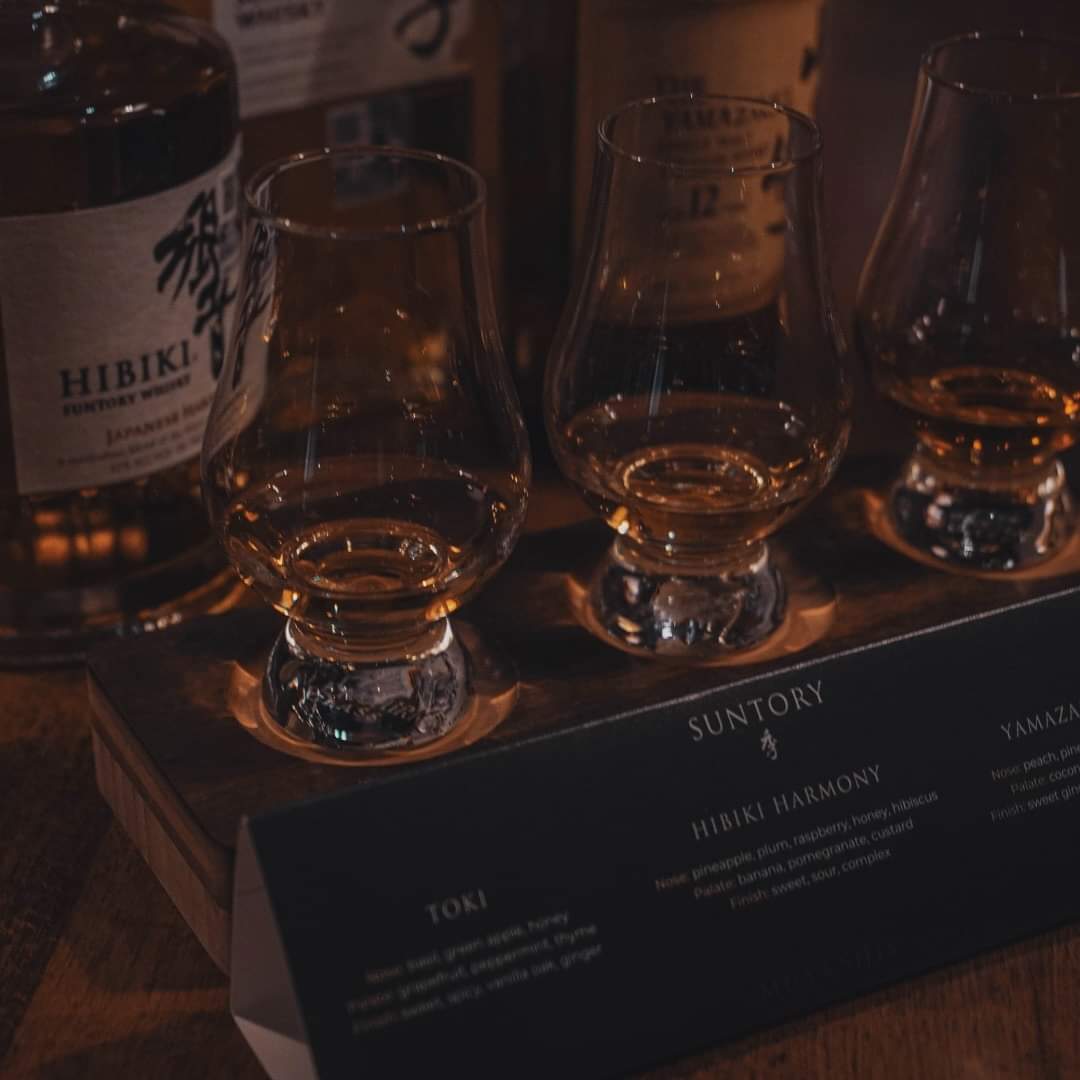 Suntory whisky flight — Toki, Hibiki Harmony and Yamazaki, with tasting notes