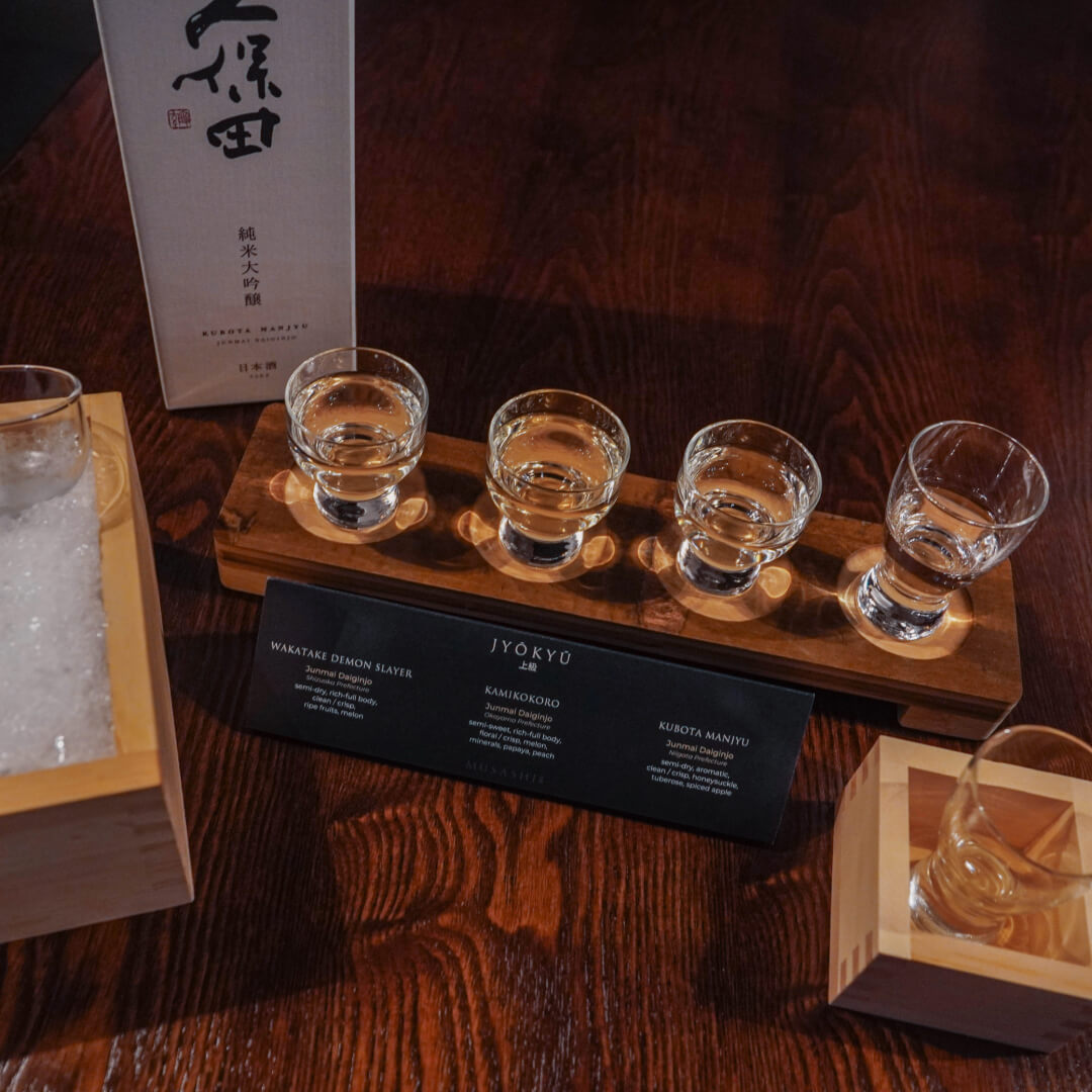 Jyōkyū sake flight — Wakatake Demon Slayer, Kamikokoro and Kubota Manjyu, with tasting notes