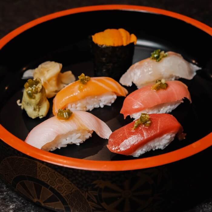 Nigiri assortment with uni, tuna, salmon and yellowtail, served with kizami wasabi