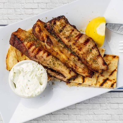 Grilled pork over pita