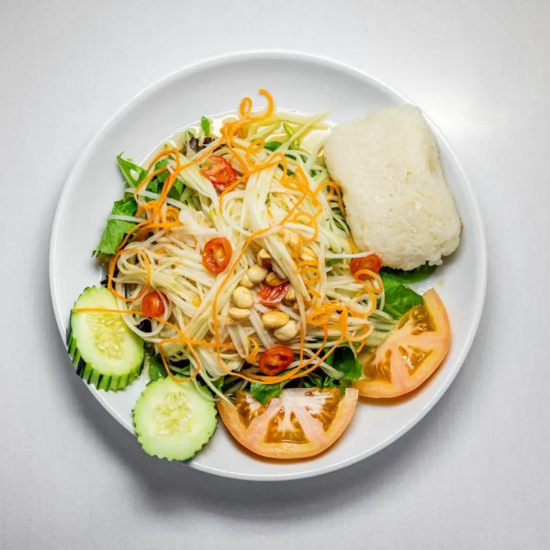 Green papaya salad with sticky rice